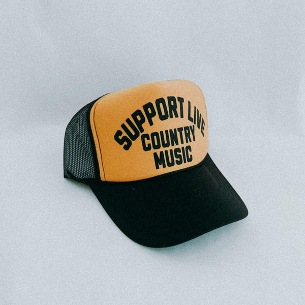 Trucker hat with 'Support Live Country Music' text on a light gray background